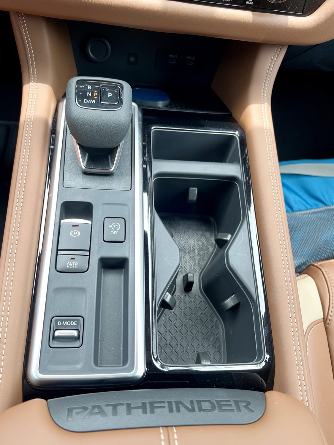 Center console showing electronic shifter, parking brake, Auto Hold, and drive mode switch
