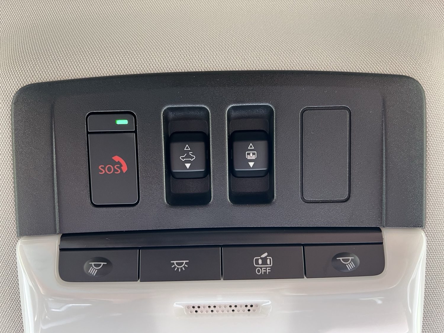 Overhead panel with SOS, moonroof, sunshade, map lights, and interior light controls